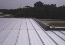 McElroy Metal ML90 Panel.  These panels were 45' long and had to be lifted to the roof with a crane.